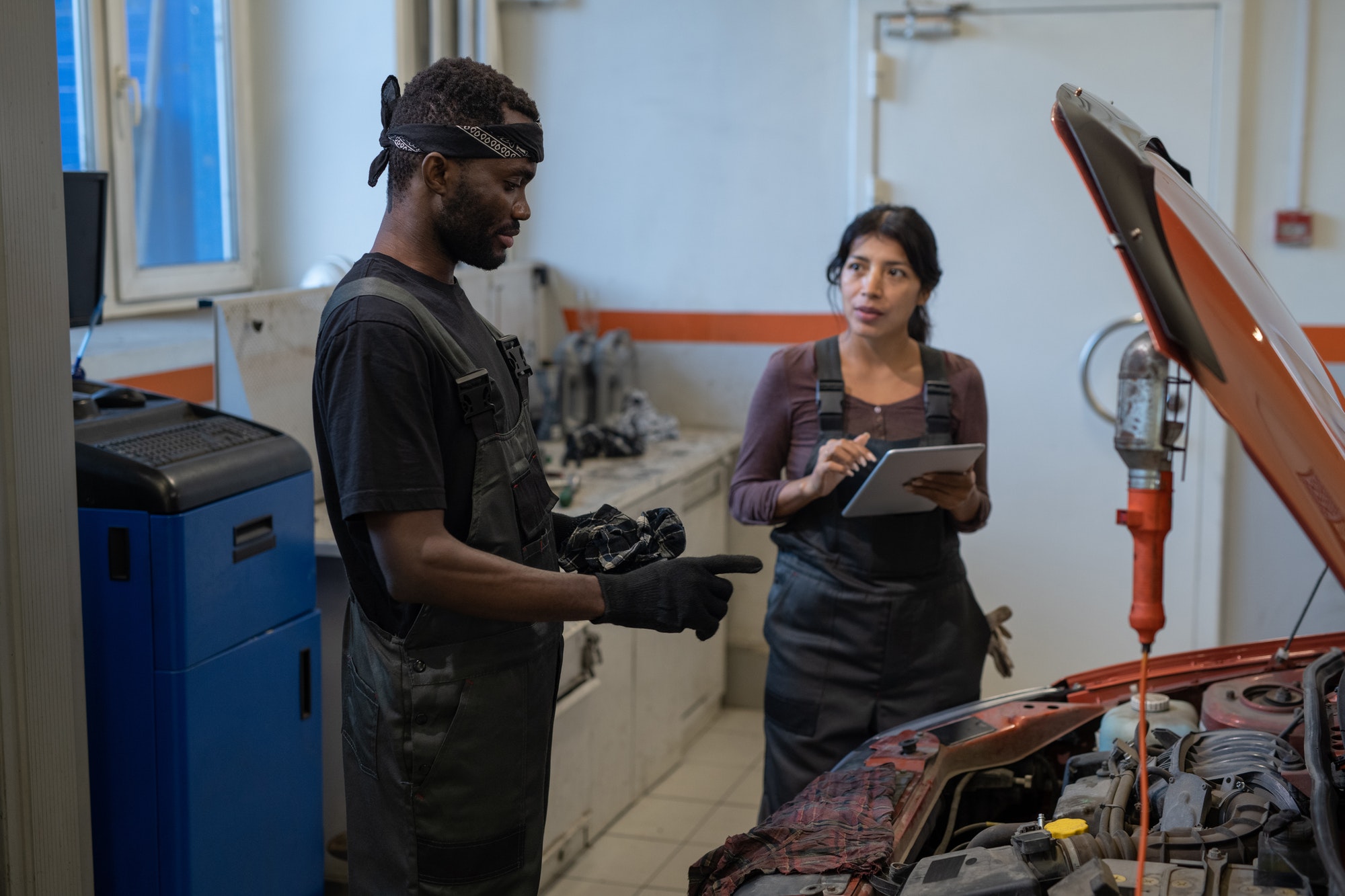 Black Mechanic in Car Repair Shop